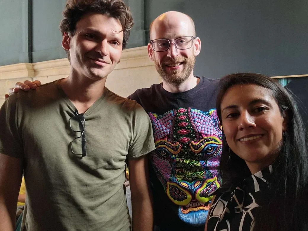 Jeffrey Dickinson with Professor Nicolas Berman and a colleague